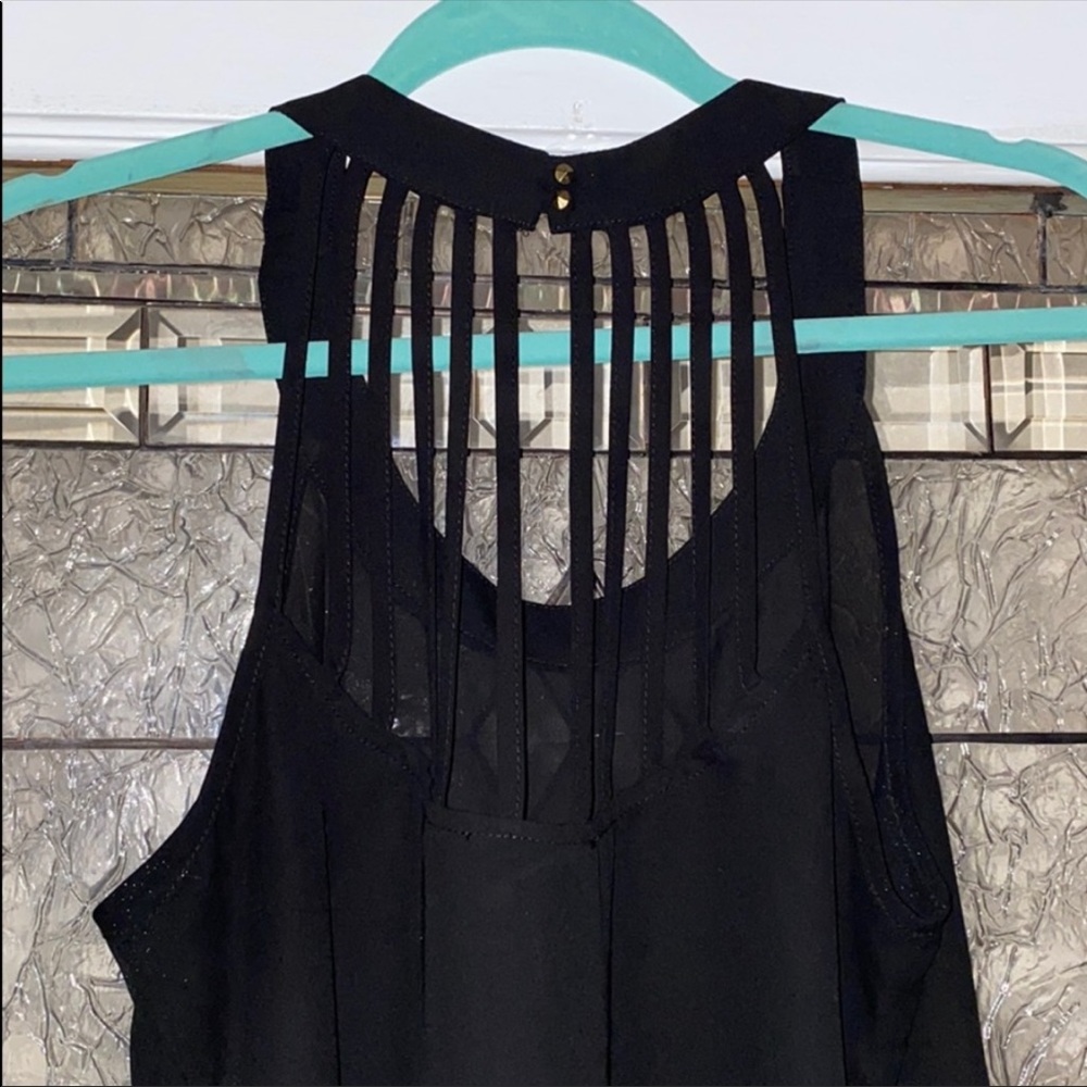 Black blouse, detailed back design 🖤